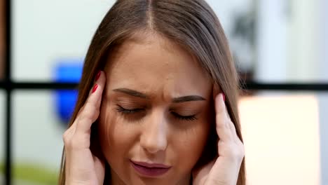 Headache,-Close-Up-of-Tense-Young-Girl