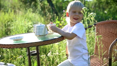 The-boy-laughs-in-the-garden