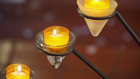 beautiful-yellow-candles-burn-in-the-Church