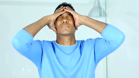 Headache,-Upset-Tense-Young-Afro-American-Man-Holding-His-Head