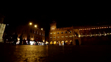 People-go-through-an-old-night-city,-Europe,-Prague