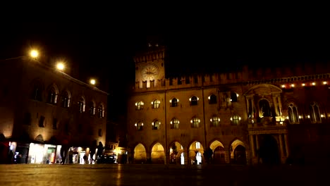 People-go-through-an-old-night-city,-Europe,-Prague