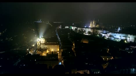 Night-panorama-of-Prague,-Panoramic-view-from-the-air-to-St.-Vitus-Cathedral-in-Prague,-lights-of-the-night-city,-Prague