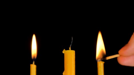 Burning-Candle-With-Black-Background.