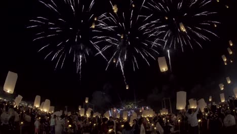 Floating-lanterns-and-fireworks-Yee-Peng-Festival,-Loy-Kra-thong-in-Chiang-mai,-Thailand