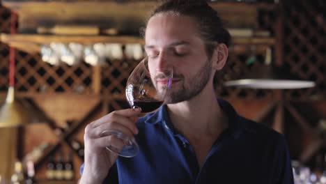 Wine-Tasting.-Man-Smelling,-Drinking-Red-Wine-At-Winery-Cellar