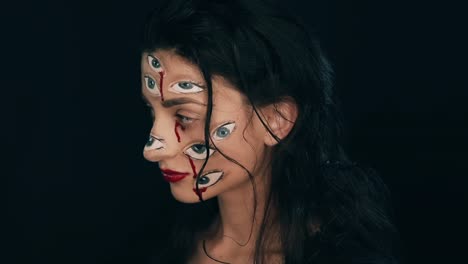 Maquillaje-de-Arte-Halloween,-la-mujer-tiene-muchos-ojos-en-una-cara