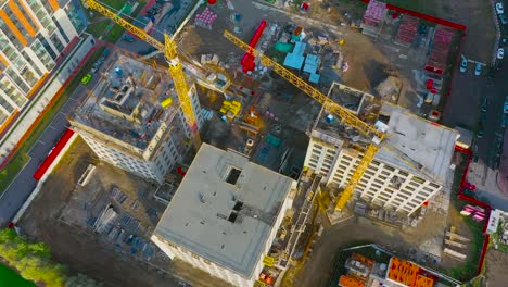 Aerial-top-view-large-scale-construction-of-a-residential-complex-with-a-view-of-construction-cranes