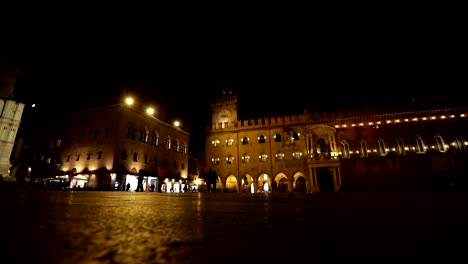 People-go-through-an-old-night-city,-Europe,-Prague