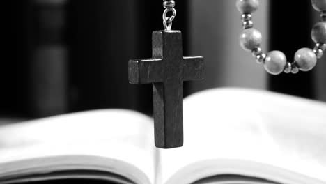 Wooden-Rosary-Hanging-in-Front-of-Library.-Panning.