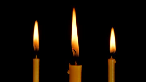 Burning-Candle-With-Black-Background.