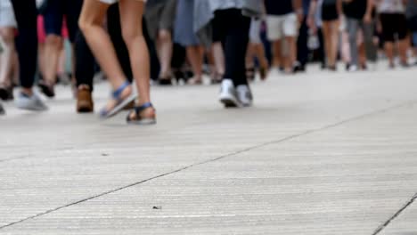 Foot-crowd-of-people-walking-on-megacity