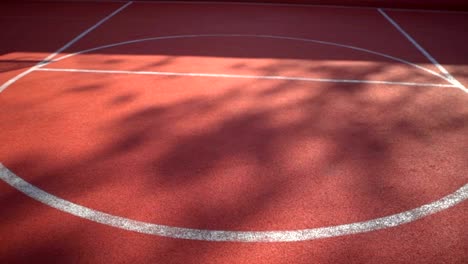 Streetball-court-with-white-lines-on-red-background