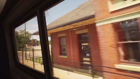 Passing-countryside-landscape-from-train-window