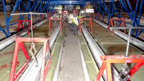 Tram-rails-at-the-stage-of-their-installation-and-integration-into-concrete-plates-on-the-road-timelapse