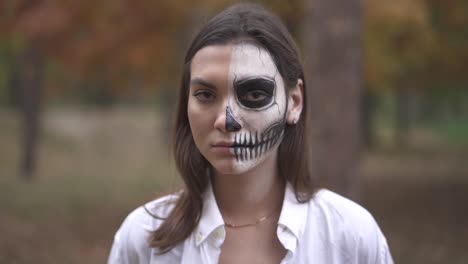 Halloween.-Young-girl-with-a-scary-Halloween-makeup