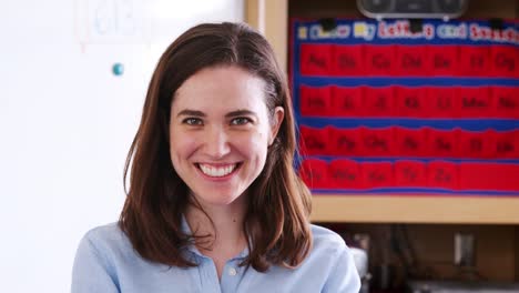 Female-elementary-school-teacher-looking-to-camera,-close-up