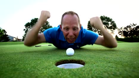 Golfer-yells-at-his-ball-to-go-into-the-hole.-Close-up-shot.