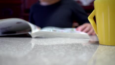 Little-girl-is-reading-at-home.