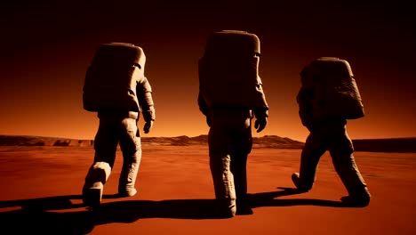 Drei-Astronauten-in-Raumanzügen-gehen-selbstbewusst-auf-dem-Mars-auf-der-Suche-nach-Leben
