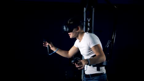 A-person-uses-equipment-to-play-VR-games.-Virtual-reality-gaming-concept.