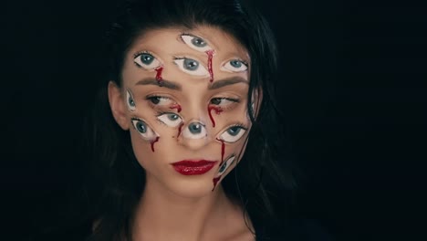 Maquillaje-de-Arte-Halloween,-la-mujer-tiene-muchos-ojos-en-una-cara