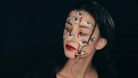 Maquillaje-de-Arte-Halloween,-la-mujer-tiene-muchos-ojos-en-una-cara