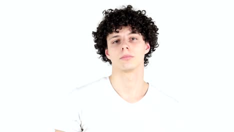 Pointing-toward-Camera,-Young-Man-with-Curly-Hairs,-white-Background