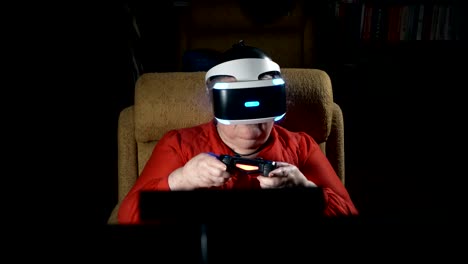 Elderly-woman-in-VR-headset-playing-virtual-reality-game-in-front-of-TV-screen