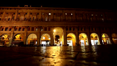 People-go-through-an-old-night-city,-Europe,-Prague