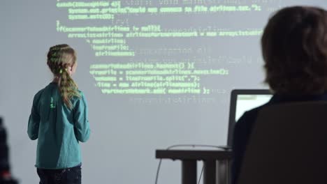 Girl-Standing-at-the-Whiteboard