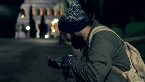 Happy-homeless-on-a-bench-after-counting-his-money