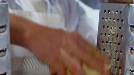 Little-Boy-Learning-to-Use-Grater