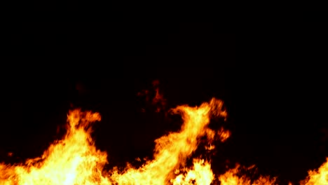 Slow-Motion-Sequence-Of-Fire-Flames-Against-Black-Background