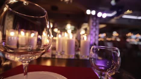 Decorative-candles-burning-on-a-banquet-table.