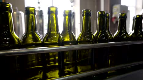 Bottling-and-sealing-conveyor-line-at-winery-factory