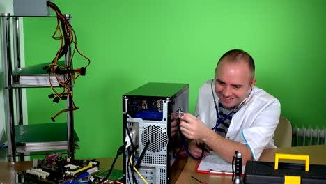 Mad-man-pc-doctor-examining-computer-case-with-stethoscope-and-laughing