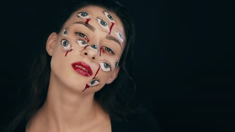 Maquillaje-de-Arte-Halloween,-la-mujer-tiene-muchos-ojos-en-una-cara