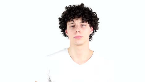 Silence,-Young-Man-with-Curly-Hairs,-white-Background,--Finger-on-Lips