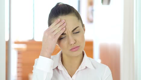 Headache,-Tense-Working-Woman-in-Office