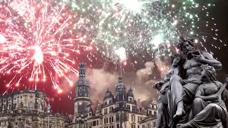 Sculpture-on-the-Bruhl-Terrace-and--Hofkirche-or-Cathedral-of-Holy-Trinity-and-holiday-fireworks---baroque-church-in-Dresden,-Sachsen,-Germany