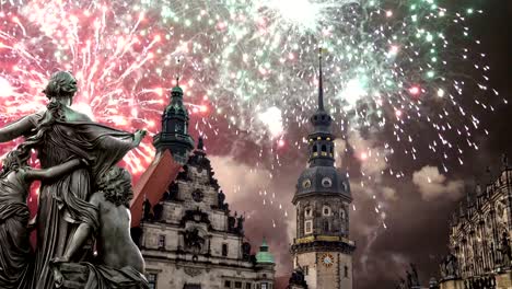 Sculpture-on-the-Bruhl-Terrace-and--Hofkirche-or-Cathedral-of-Holy-Trinity-and-holiday-fireworks---baroque-church-in-Dresden,-Sachsen,-Germany