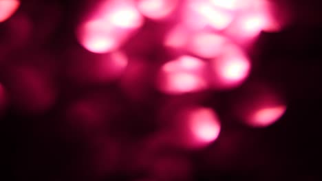 Luz-puntos-resplandores-borrosas.-Muchas-fugas-de-color-rojo-o-púrpura.-Luz-fugas-o-transiciones-para-componer-la-película---efecto-real,-no-generada-por-ordenador