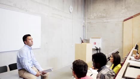 group-of-students-and-teacher-in-lecture-hall