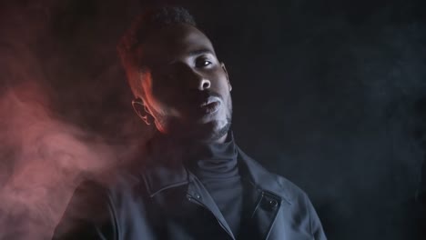 Confident-Black-Man-Posing-in-Dark-Studio