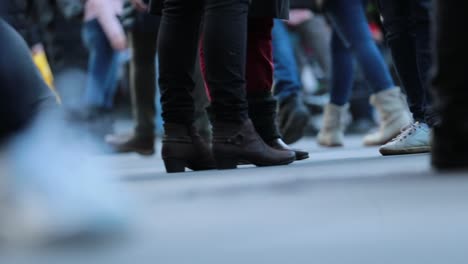 Crowd-feet-in-120fps.-Legs-of-Crowd-People-Walking-on-the-Street-in-slow-motion