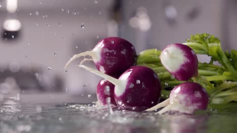 Falling-of-radish-into-the-wet-table.-Slow-motion-480-fps