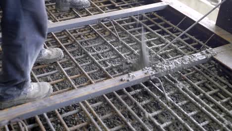 Workers-and-engineers-pour-foundation.-Tons-of-concrete-and-reinforcement-form-a-solid-monolithic-compound