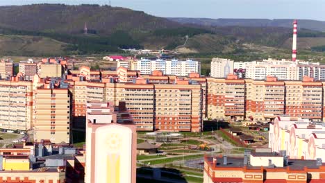 Drone-Moves-over-Multi-level-Buildings-with-Sports-Ground