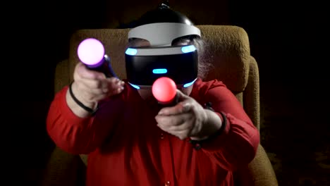 Elderly-woman-in-VR-headset-uses-move-motion-controller-for-video-game-console